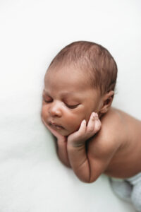 newborn baby boy posed on white backdrop - Newborn Photography in Martinez, Ga &amp; Augusta, Ga