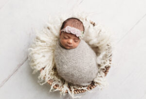 Baby girl newborn wrapped up in basket - Newborn Photography in Martinez, Ga & Augusta, Ga