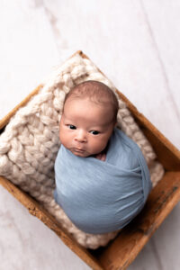 Newborn Photo Shoot in Martinez, Ga & Augusta, Ga - Baby wrapped up in box